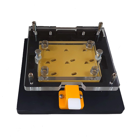 手　壓　治　具